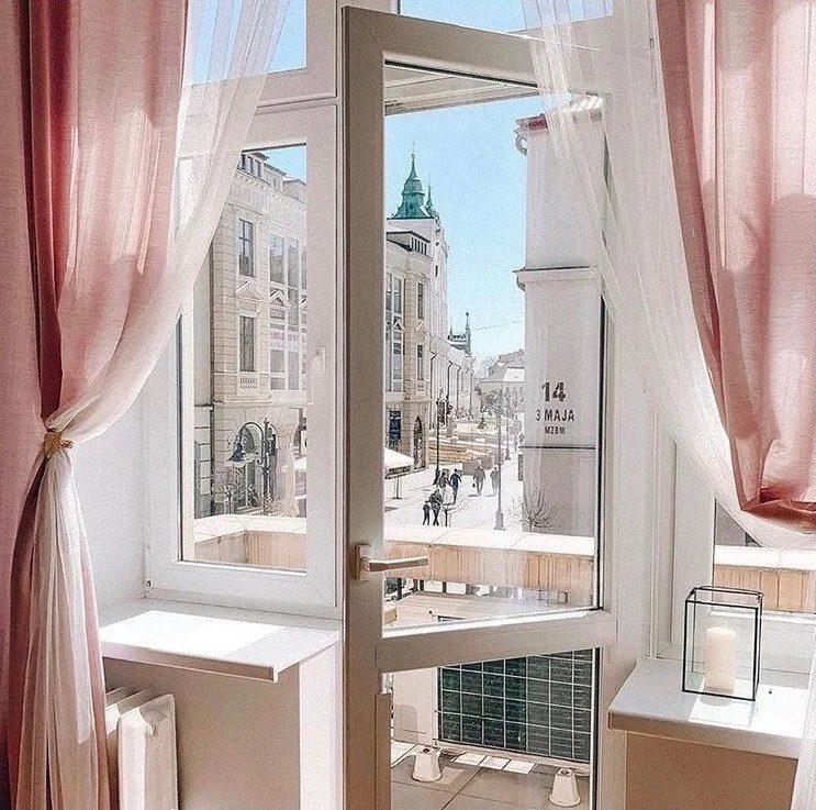View over Rzeszów from the salon window in a historic tenement, 2019