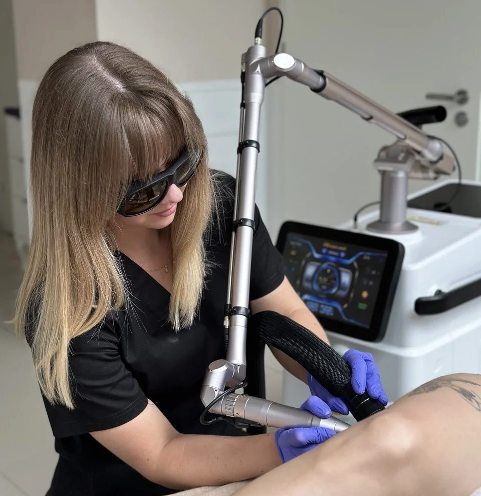 Laser removal treatment in protective goggles, 2022